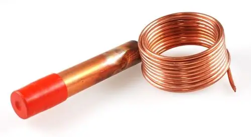 Kupferrohr mit rotem Kunststoffkopf, spiralförmig gewickelt. Einsatzmöglichkeit bei Umbausätzen, wie dem von Remko, zur Wärmezirkulation.
