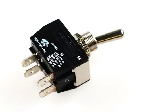 Schalter mit einer metallenen Wippe und mehreren Anschlussklemmen. Der Schalter stammt von der Marke Remko und ist für elektronische Anwendungen geeignet.
