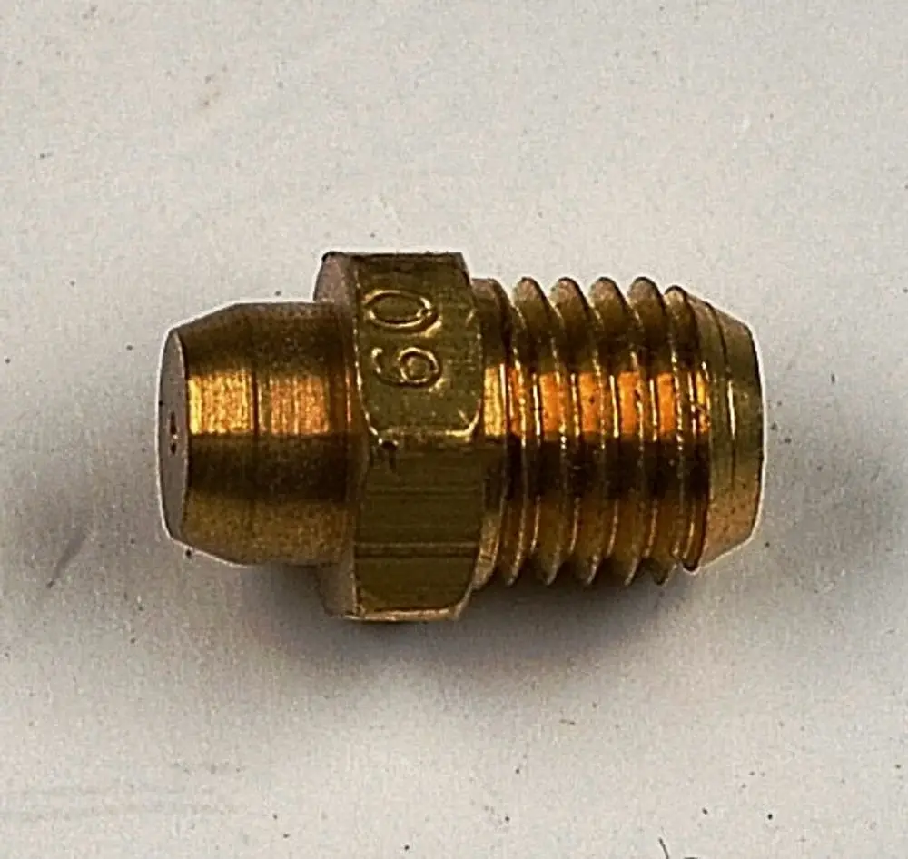 Zündgasdüse von Remko, metallisch, mit Gewinde und markierter Spitze, geeignet für Erdgas. Klare Form und Struktur zur Verwendung in Heizsystemen.