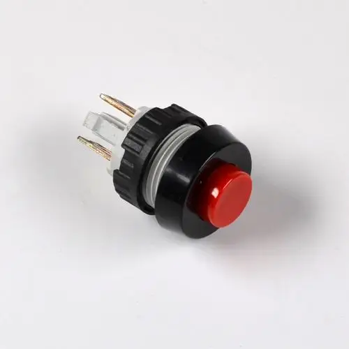 Runder, roter Druckknopf mit schwarzem Gehäuse und zwei Anschlussstiften. Produkt von Remko, geeignet für verschiedene elektrotechnische Anwendungen.