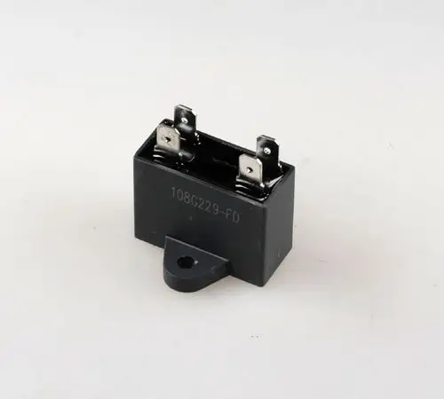 Remko-Komponente in rechteckiger Form, mit zwei Anschlussbeinen, möglicherweise ein elektrisches Bauteil für Kühl- oder Heizsysteme.