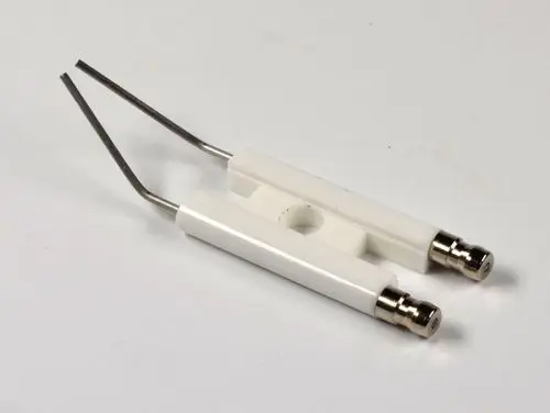 Zündelektrodenblock von Remko mit zwei Metallanschlüssen und weißem Gehäuse, geeignet für Anwendungen in Heizsystemen.