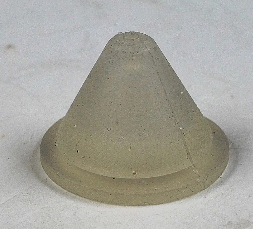 Dichtungstülle in konischer Form, aus transparentem Material, auf hellem Hintergrund, möglicherweise für Anwendungen von Remko geeignet.