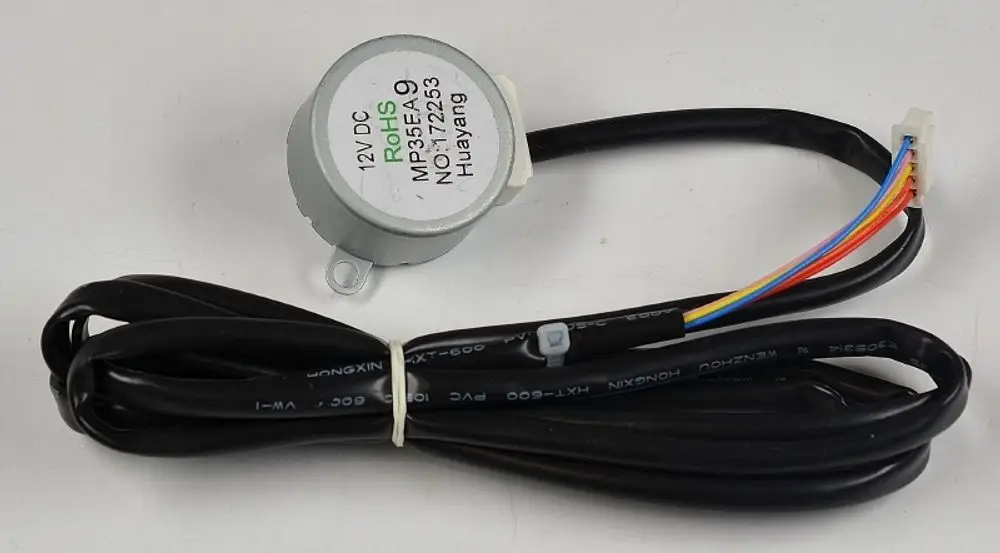 Elektromotor mit runder Gehäuseform, Kabel mit mehreren Adern. Typische Anwendung für Klappensteuerungen in Lüftungssystemen, wie bei Remko.
