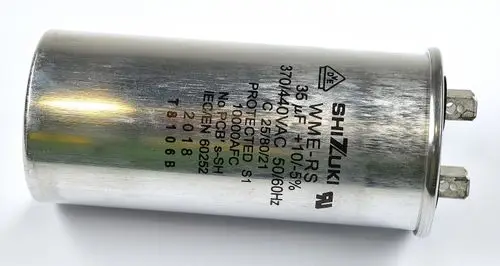Silberner Kondensator mit zwei Anschlussstiften, gekennzeichnet mit "SHIZUKI" und technischen Spezifikationen, einschließlich 35 µF und 370/440 VAC, für Anwendungen wie Kompressoren von Remko.