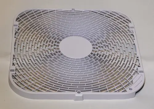 Remko Lüfterschutzgitter in quadratischer Form mit Gitterstruktur, geeignet für die Abdeckung von Lüftern in Geräten wie EMF/T 100 und CMF/T 85.
