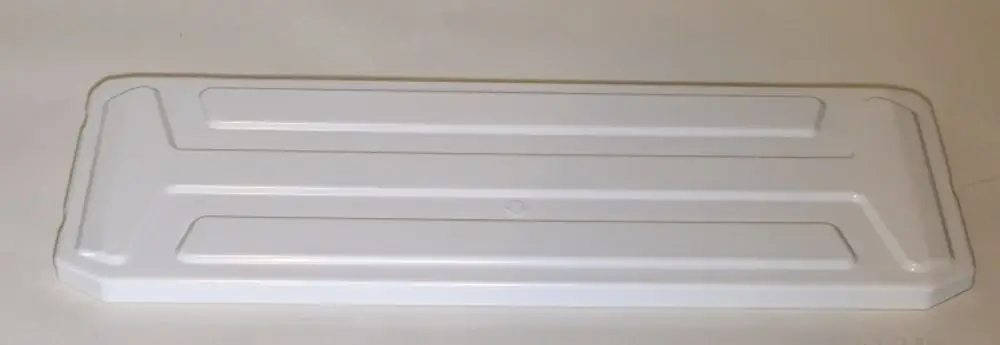 Weiße Platte mit flacher, rechteckiger Form und strukturiertem Design, geeignet zur Verwendung in Remko-Geräten.