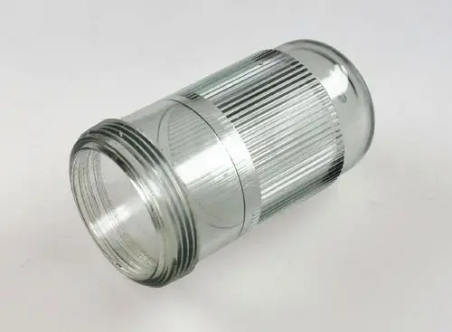 Transparente Filtertasse von Remko mit grooved Design und Gewinde. Geeignet für die Verwendung mit verschiedenen Filtern oder Zubehörteilen.