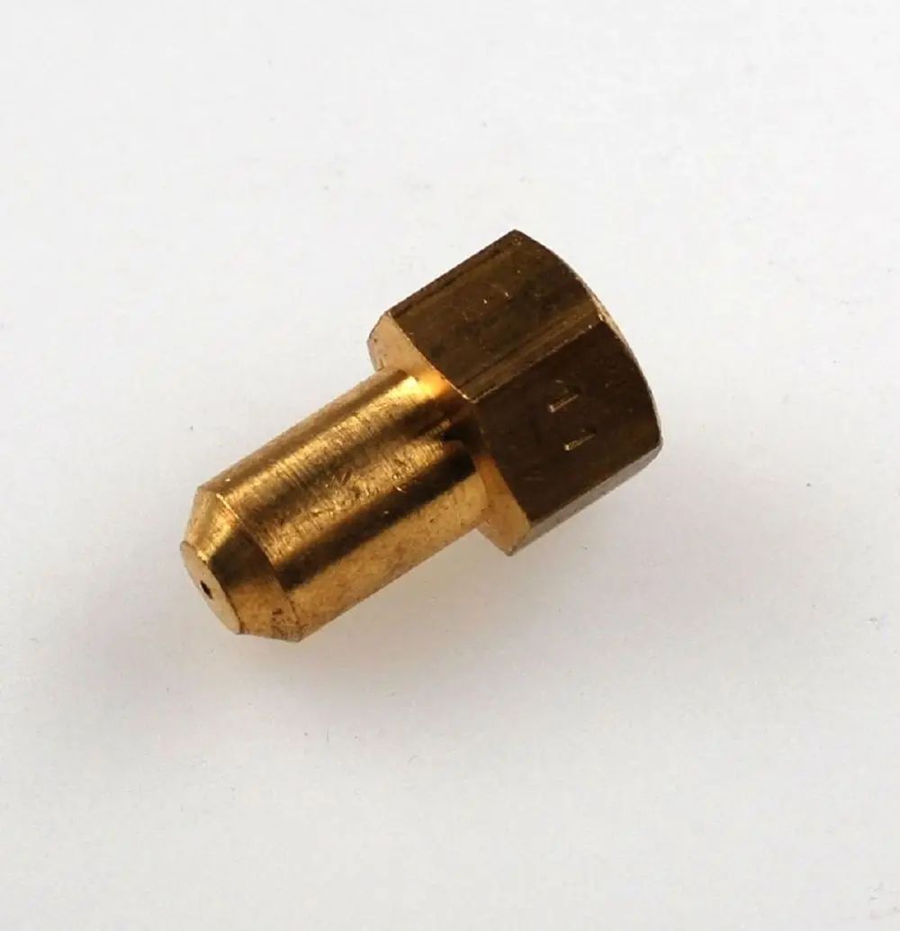 Gasdüse aus Messing, mit hexagonalem Kopf und konischer Spitze, hergestellt von Remko. Eignet sich für Anwendungen in Heizsystemen.
