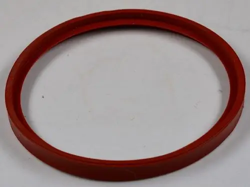 Rote Dichtung in Ringform auf weißem Untergrund. Geeignet für Anwendungen, möglicherweise von der Marke Remko.