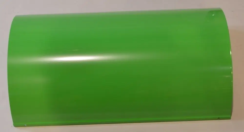 Grüne, glänzende Abdeckung von Remko, in zylindrischer Form, die auf einem neutralen Hintergrund liegt, ohne erkennbare Maße oder Produktbezeichnung.