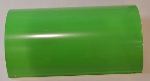 Grüne, glänzende Abdeckung von Remko, in zylindrischer Form, die auf einem neutralen Hintergrund liegt, ohne erkennbare Maße oder Produktbezeichnung.