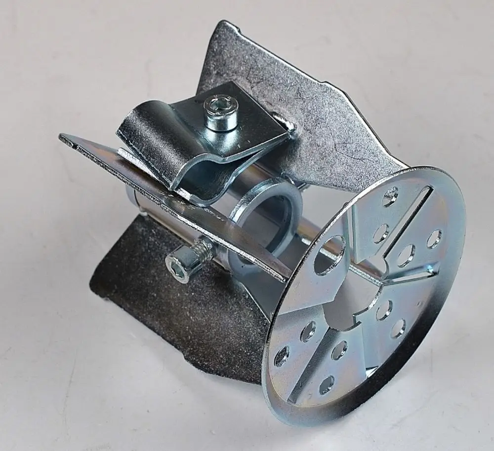 Stauscheibe von Remko, aus Metall, mit Montageelementen und einer kreisförmigen Basis. Geöffnet durch eine Hebelmechanik und ausgestattete Bohrungen zur Befestigung.