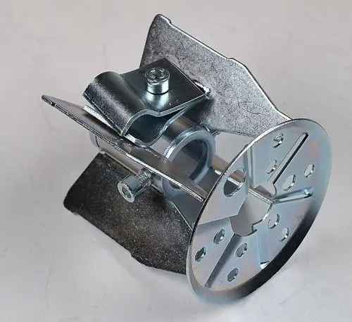 Stauscheibe von Remko, aus Metall, mit Montageelementen und einer kreisförmigen Basis. Geöffnet durch eine Hebelmechanik und ausgestattete Bohrungen zur Befestigung.