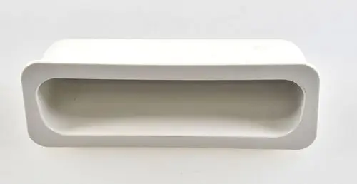 Weißer Kunststoffgriff mit rechteckiger Mulde von Remko, ohne erkennbare Maße, auf hellem Hintergrund abgebildet.