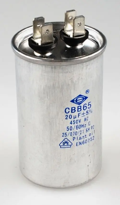 Aluminiumkondensator mit zwei Anschlussklemmen und blauer Kennzeichnung. Der Kondensator ist für Wechselstromanwendungen geeignet und stammt von der Marke Remko.