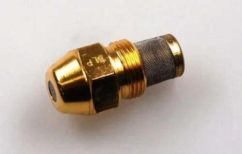 Öldüse mit metallischem Gehäuse, ausgestattet mit einem feinen Sieb, geeignet für den Gebrauch mit Remko Heizgeräten, zur präzisen Ölverteilung in Heizsystemen.