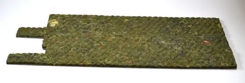 Isoliermaterial in grüner Farbe, strukturiert mit Wellenmuster, möglicherweise für den Einsatz in Kälte- oder Klimaanlagen. Hersteller Remko.