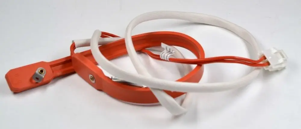 Kurbelwannenheizung in Orange mit Anschlusskabel und Stecker, ideal für den Einsatz in Heizsystemen, hergestellt von Remko.