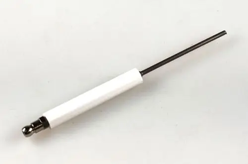 Zündelektrode von Remko, mit einer weißen Isolierung und einem langen, dünnen Metallstift. Geeignet für bestimmte Heizsysteme.