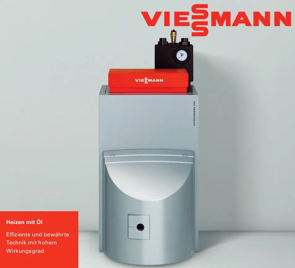 Viessmann Heizgerät, montiert an Wand, mit rotem Bedienfeld und Druckmanometer. Der untere Teil ist aus Metall, mit runder Klappe und Anschlussöffnung.