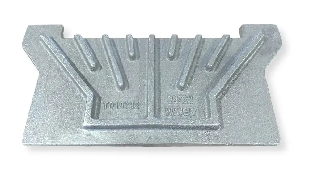 Metallisches Einlegerost mit Rillenstruktur, geeignet für Fröling S4 Kessel. Zeigt keine spezifischen Maße oder weitere Bezeichnungen.