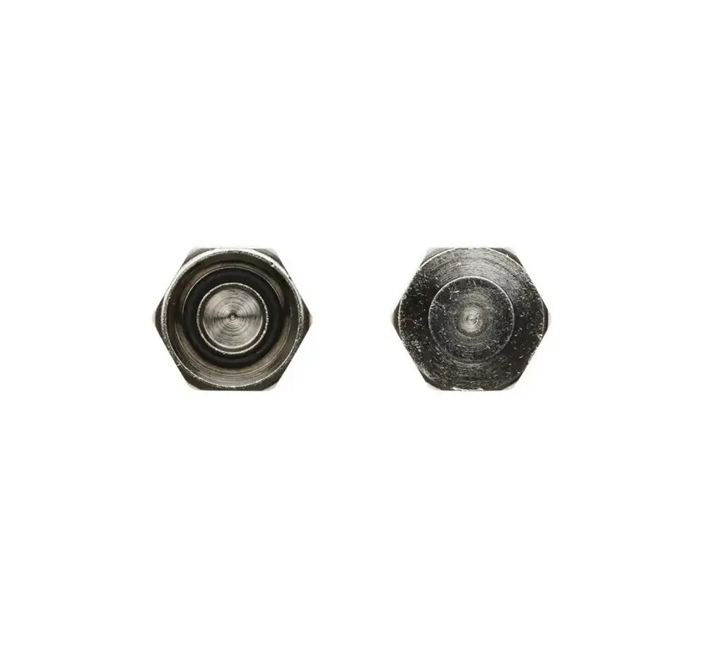 Brötje Dichtkappen in hexagonaler Form, sichtbar von oben und unten, zeigen eine glatte Metalloberfläche und eine Aussparung in der Mitte.