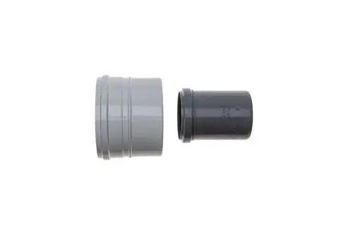 Adapter von Brötje, bestehend aus zwei verbundenen Rohren in grauer und schwarzer Ausführung, zur Verbindung von Rohrleitungssystemen.