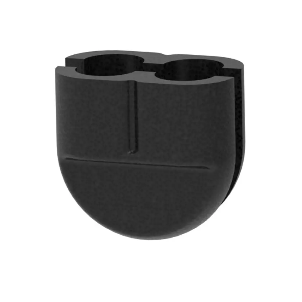 Dämmkörper in Schwarz mit zwei runden Aussparungen. Geeignet für U-Rohre. Produkt von Brötje zur Dämmung in Heizungsanwendungen.