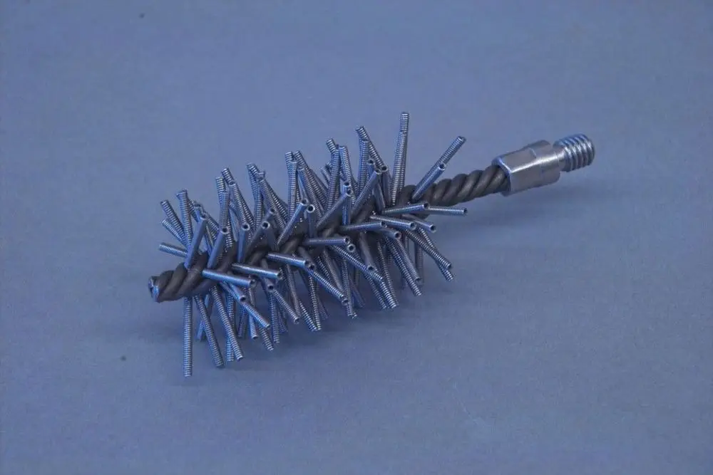 Metallisches Werkzeug mit einer spiralförmigen Basis und starren, nach außen gerichteten Elementen, hergestellt von Brötje. Eignet sich offensichtlich für spezifische industrielle Anwendungen.