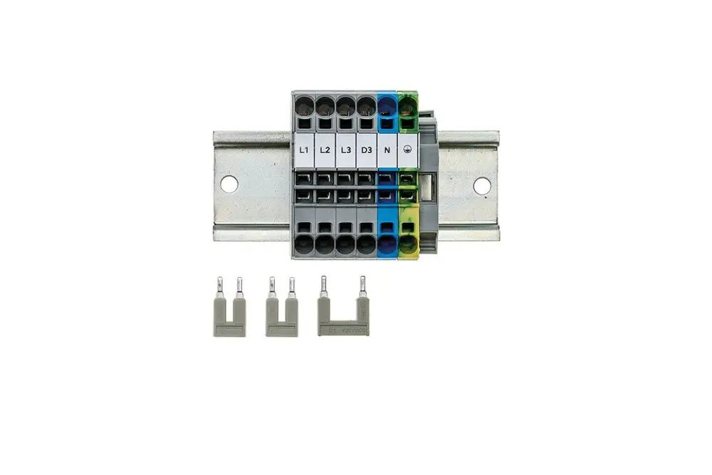 Brötje elektrische Anschlussübersicht mit fünf Klemmanschlüssen für Phasen und Erde, montiert auf einer Metallbasis.