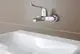 Chromfarbener Waschtisch-Einhebelmischer von Grohe, wandmontiert, mit einem modernen, schlichten Design und einem Hebel zur einfachen Steuerung des Wasserflusses.