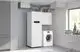 Viessmann Vitovent 300-W Lüftungsgerät, Typ H32S C400 (R) Z019042, in Waschküche mit Waschmaschine, Boiler und Bügelbrett.