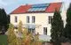 Viessmann Vitosol 100-FM Solaranlage auf einem Hausdach.